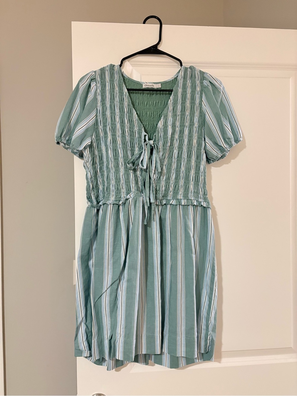 Linen-blend Ghanda green striped dress with tie front